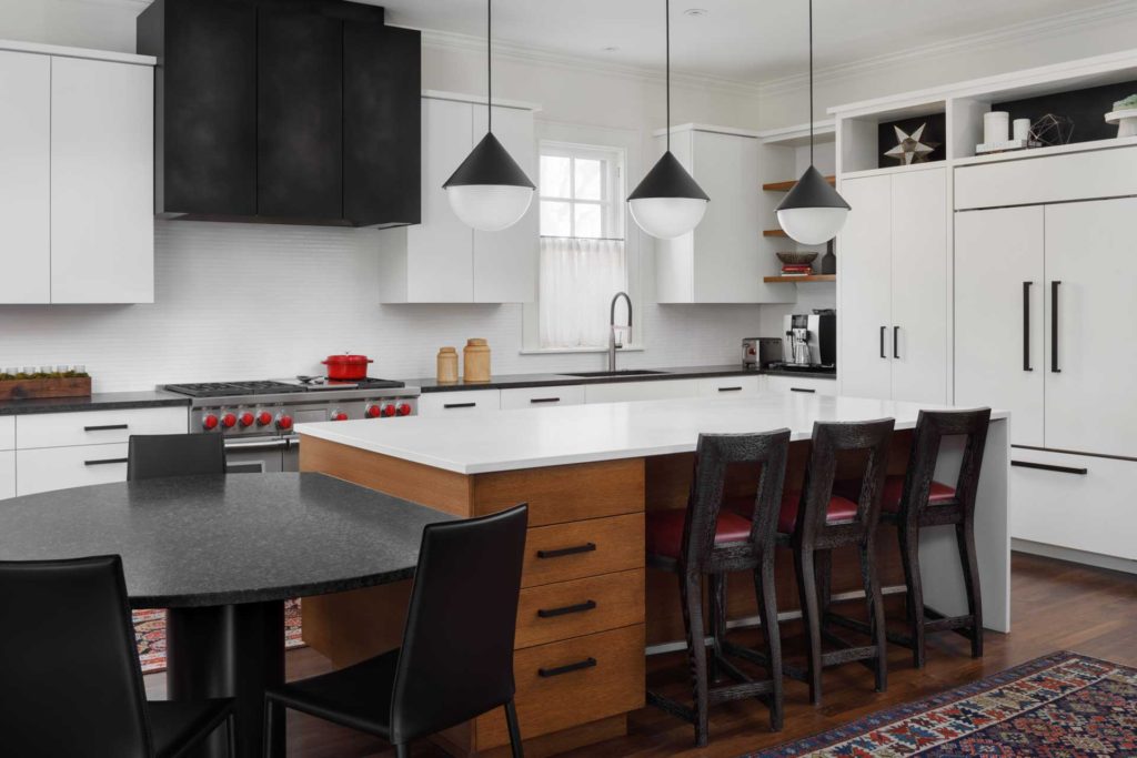 Black and white kitchen with wood accents
