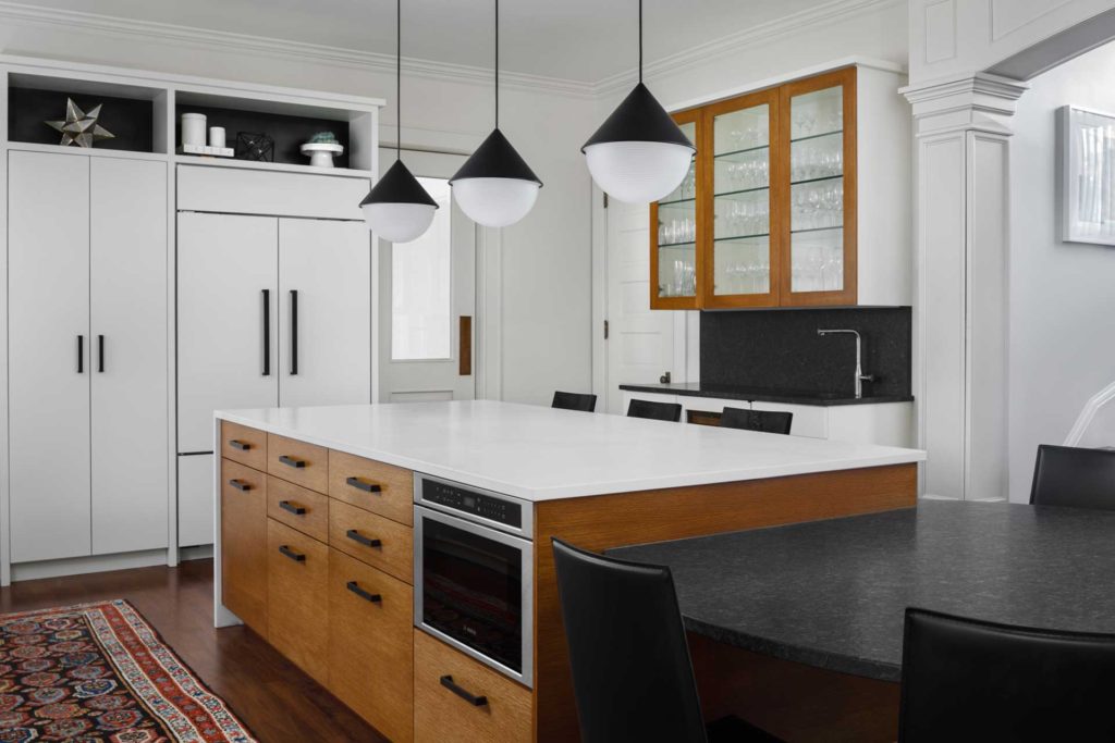 Large kitchen island with attached dining area