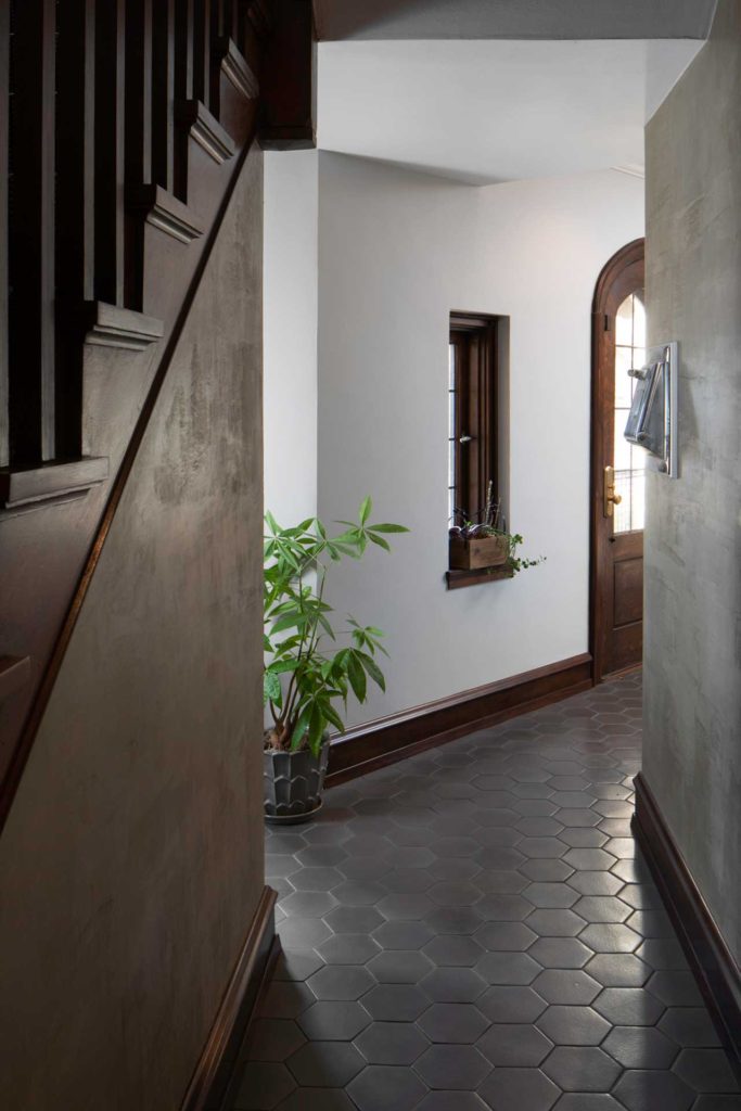 Tiled entry hallway and stairs