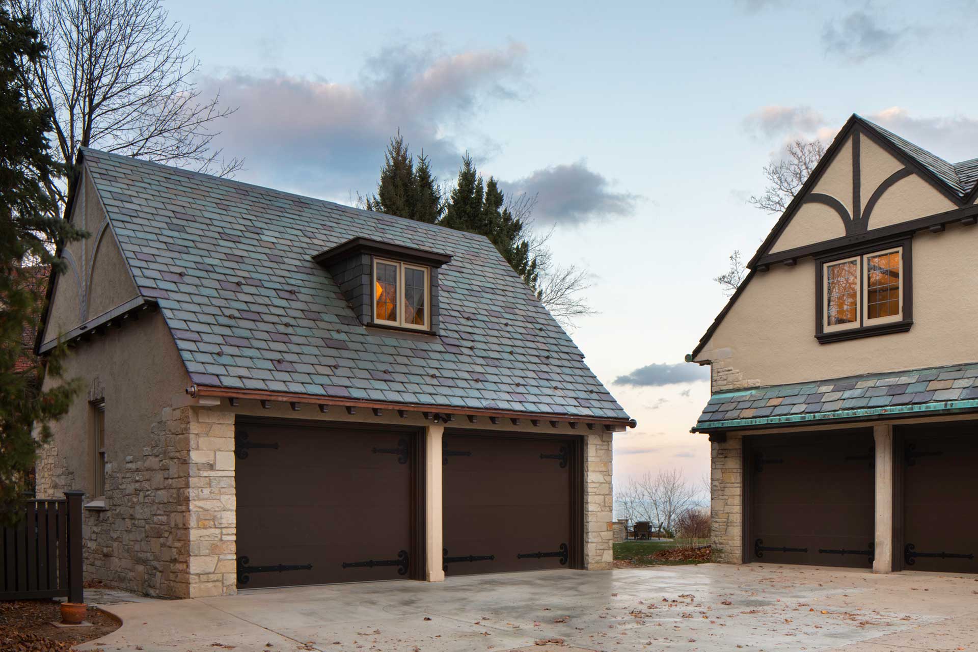 Two-car stone garage in evening