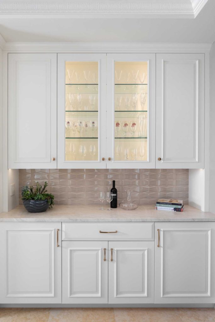 Glass front cabinets with glassware