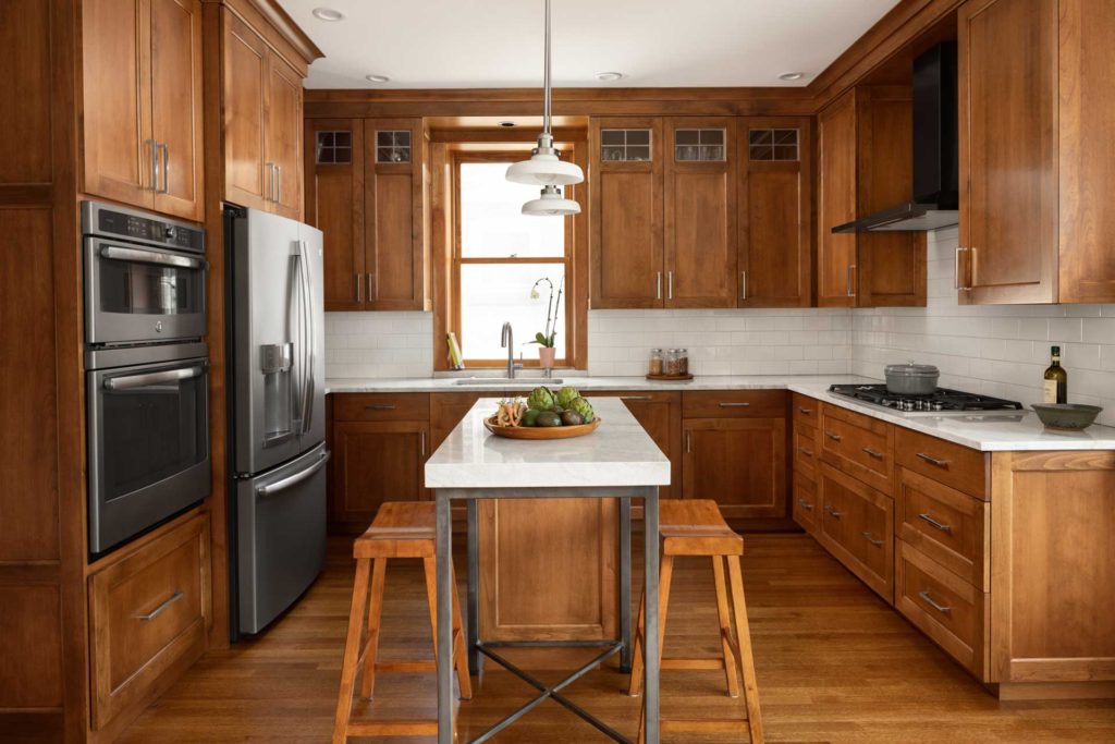 Kitchen view with appliances and cabinets